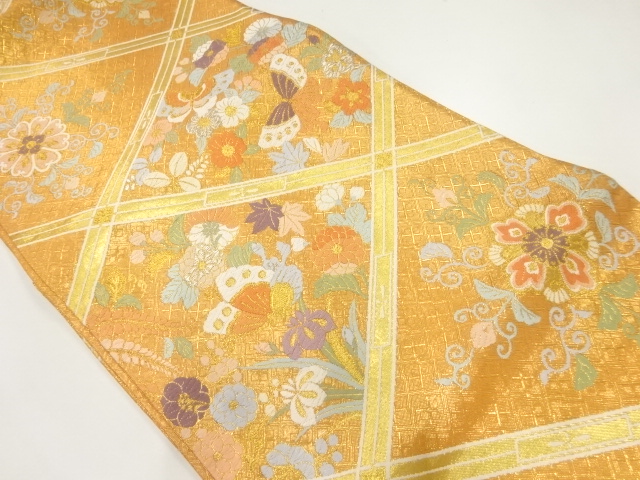 襷に蝶・草花模様織出し袋帯